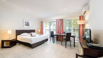 Suite junior | Ropa de cama de alta calidad y caja de seguridad en la habitación