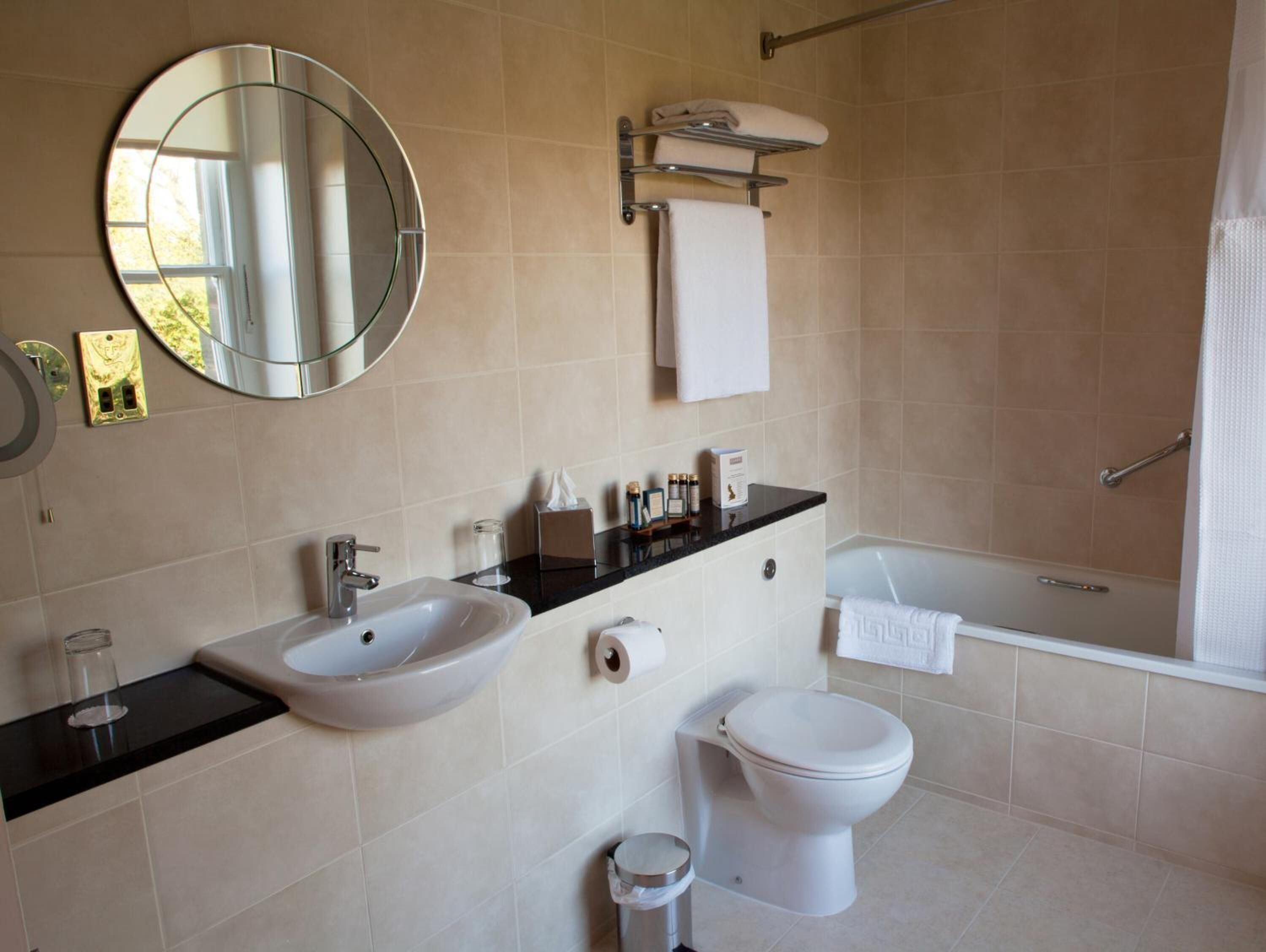 combined shower/bathtub, free toiletries, hair dryer, towels