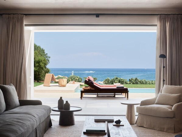 Presidential Suite, 1 King Bed, Beach View, Beachfront | Living area | 32-inch LCD TV with satellite channels, TV