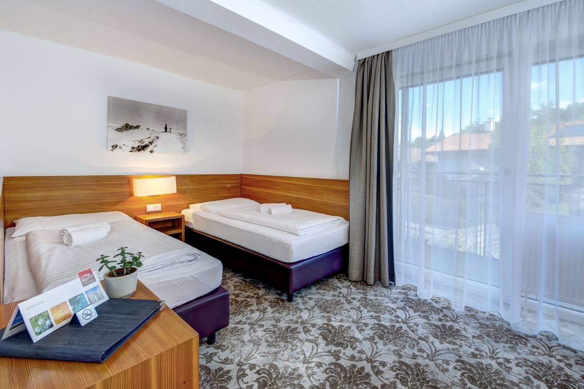 family room, balcony | premium bedding, in-room safe, soundproofing, free wifi