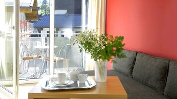 Standard Room, Balcony | Living area | Flat-screen TV