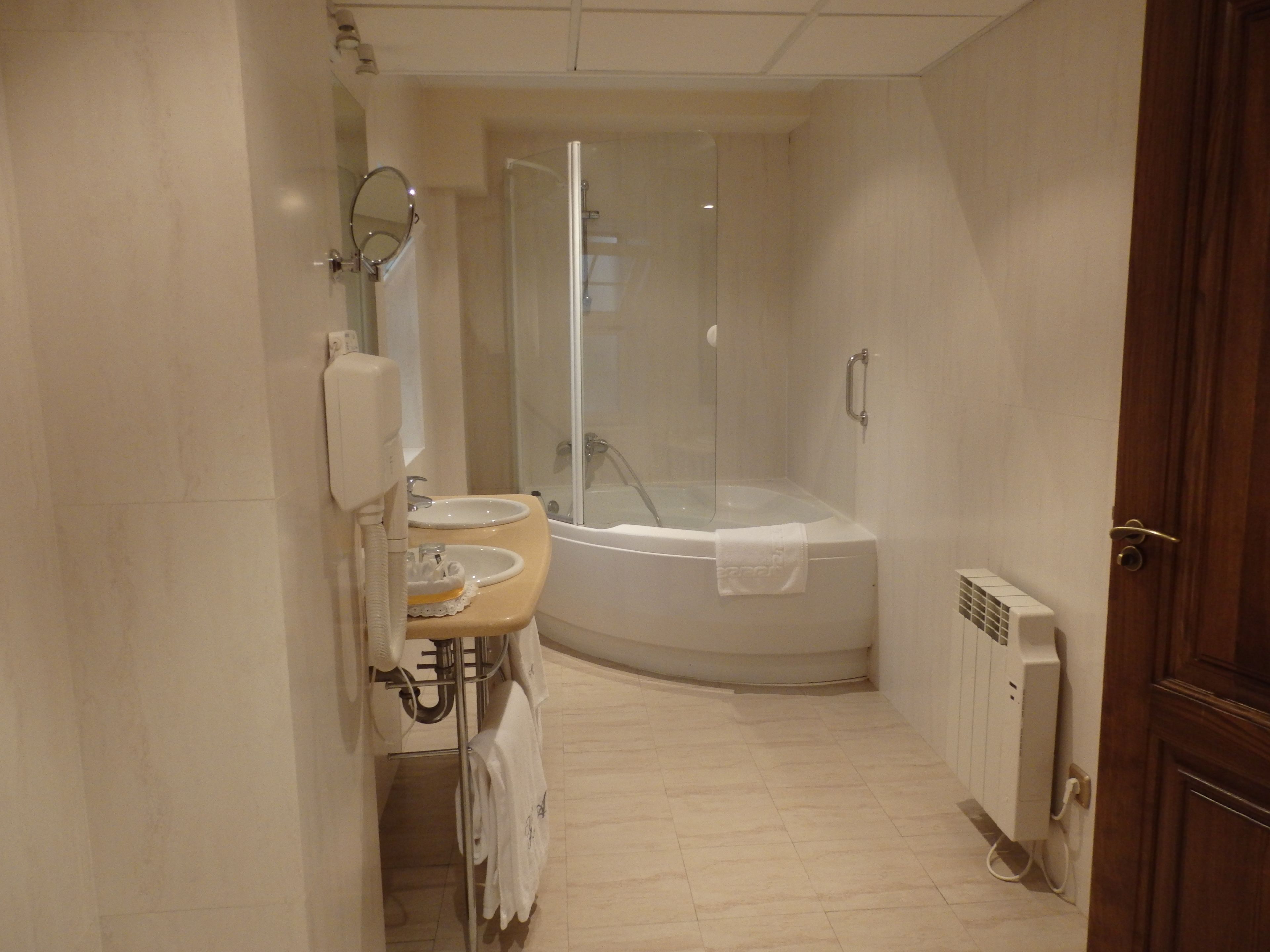 suite | bathroom | hair dryer, towels