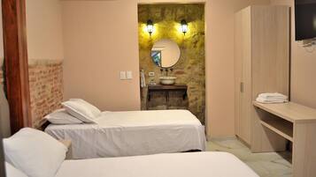 Triple Room | Minibar, in-room safe, soundproofing, iron/ironing board