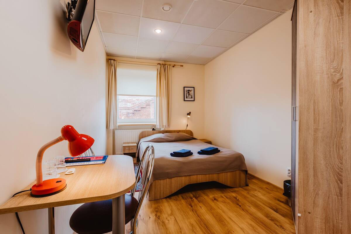 Desk, iron/ironing board (on request), WiFi (free)