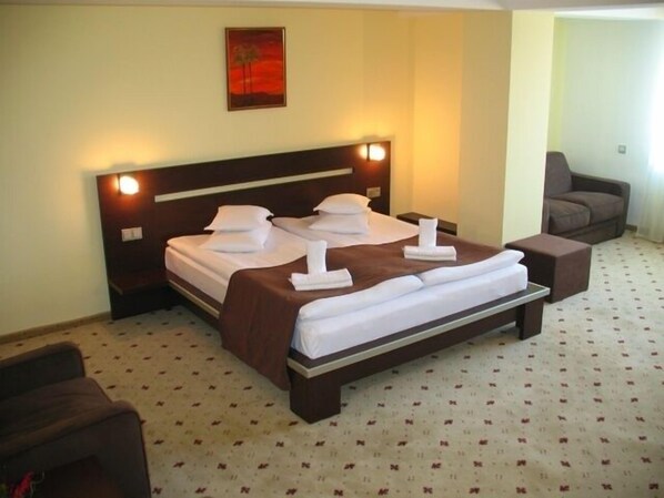 1 habitación, camas con pillow-top y minibar 