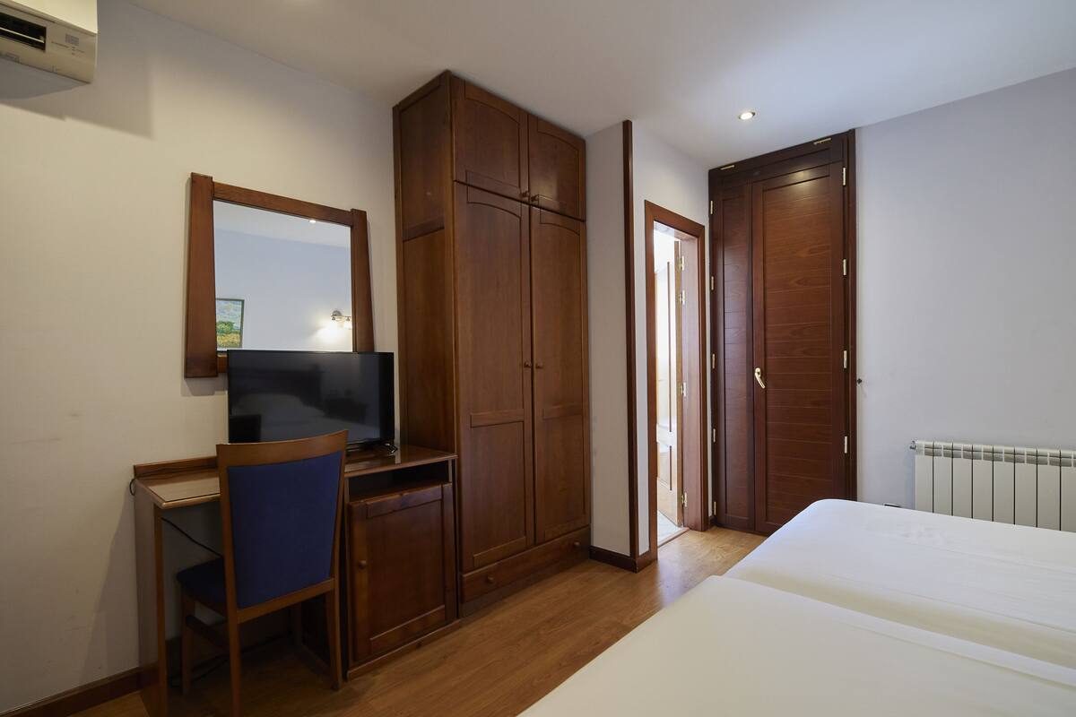 classic twin room | select comfort beds, minibar, in-room safe, desk