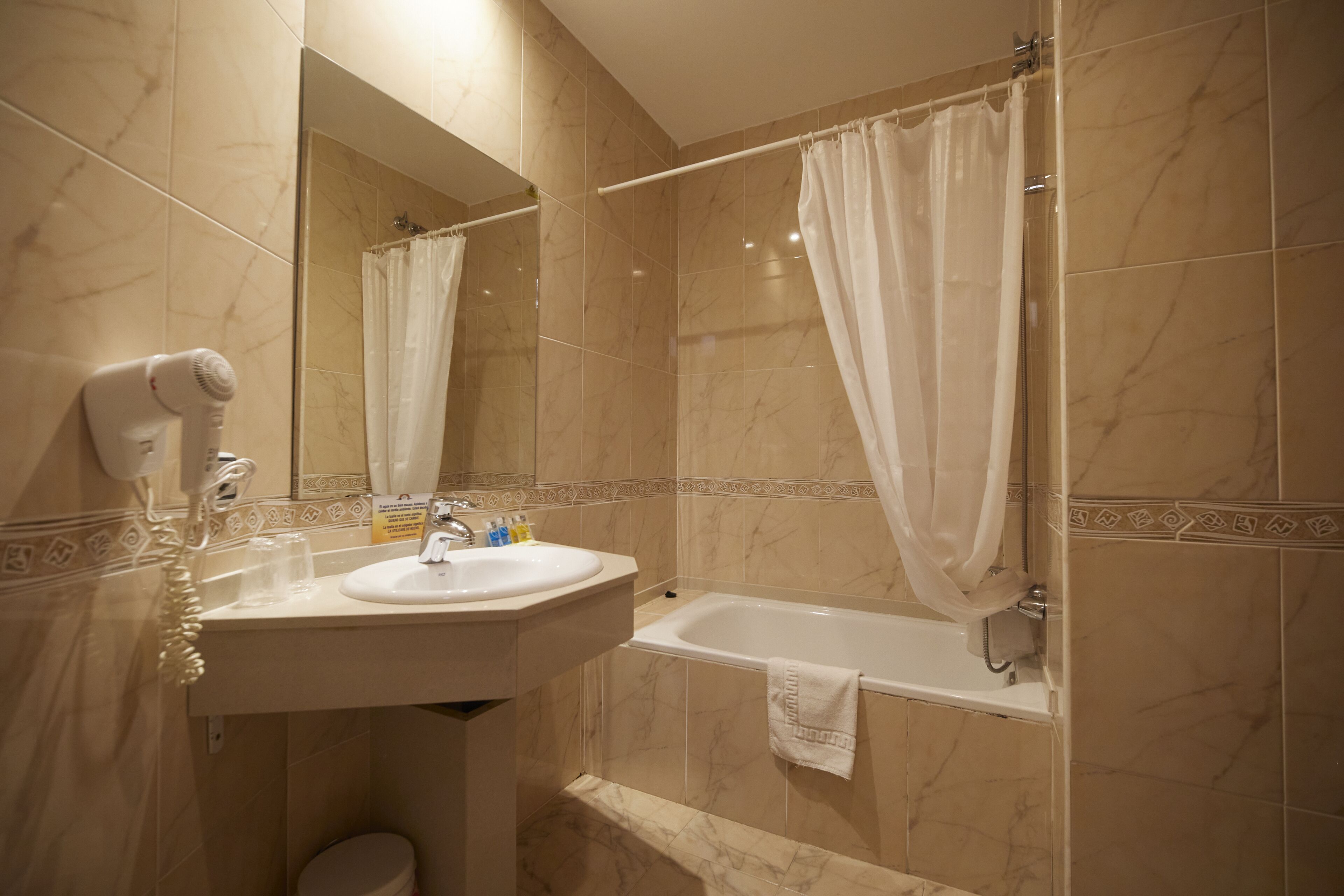classic twin room | bathroom | free toiletries, hair dryer, towels