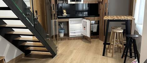 Comfort Duplex | Living area | 22-inch plasma TV with digital channels, TV