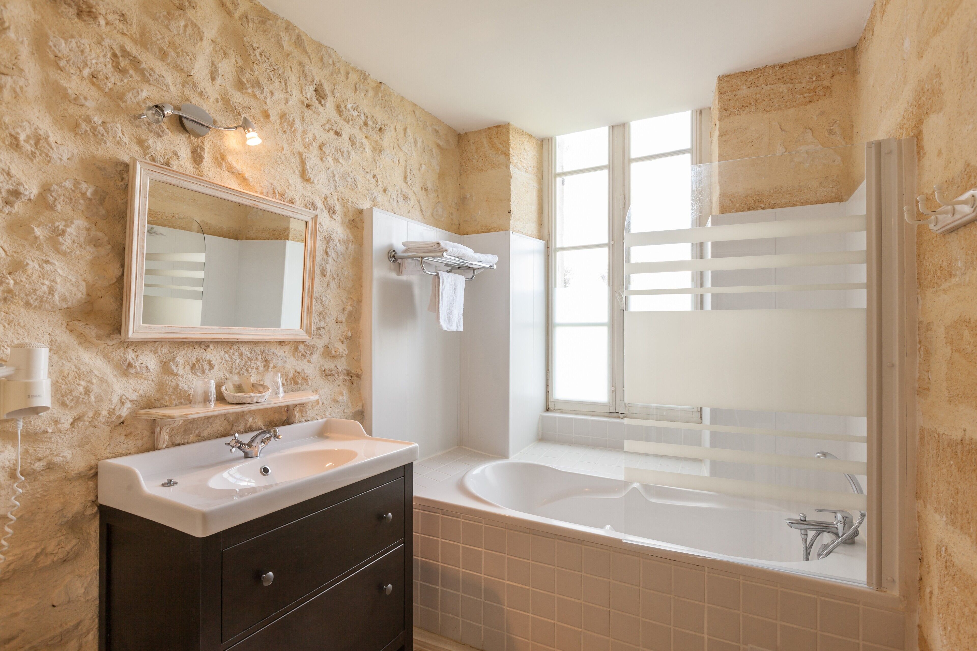 superior double room | bathroom | hair dryer, towels