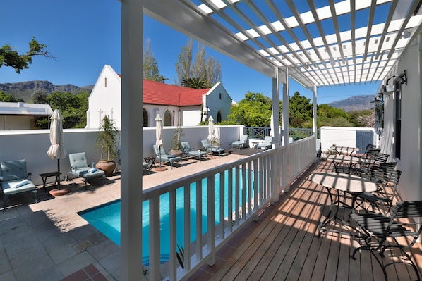 Outdoor pool, pool umbrellas, pool loungers