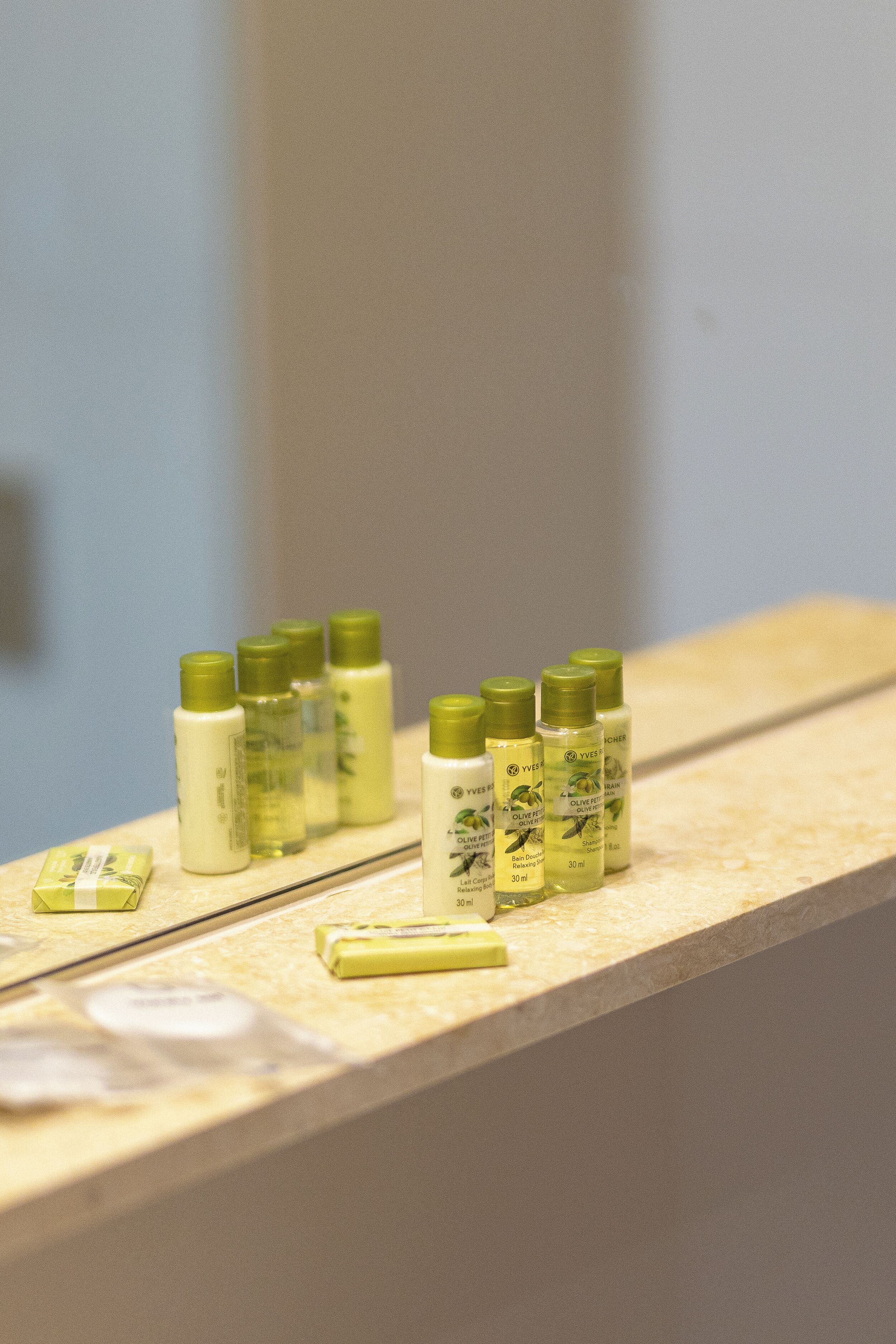 economy loft | bathroom | shower, rainfall showerhead, designer toiletries, hair dryer