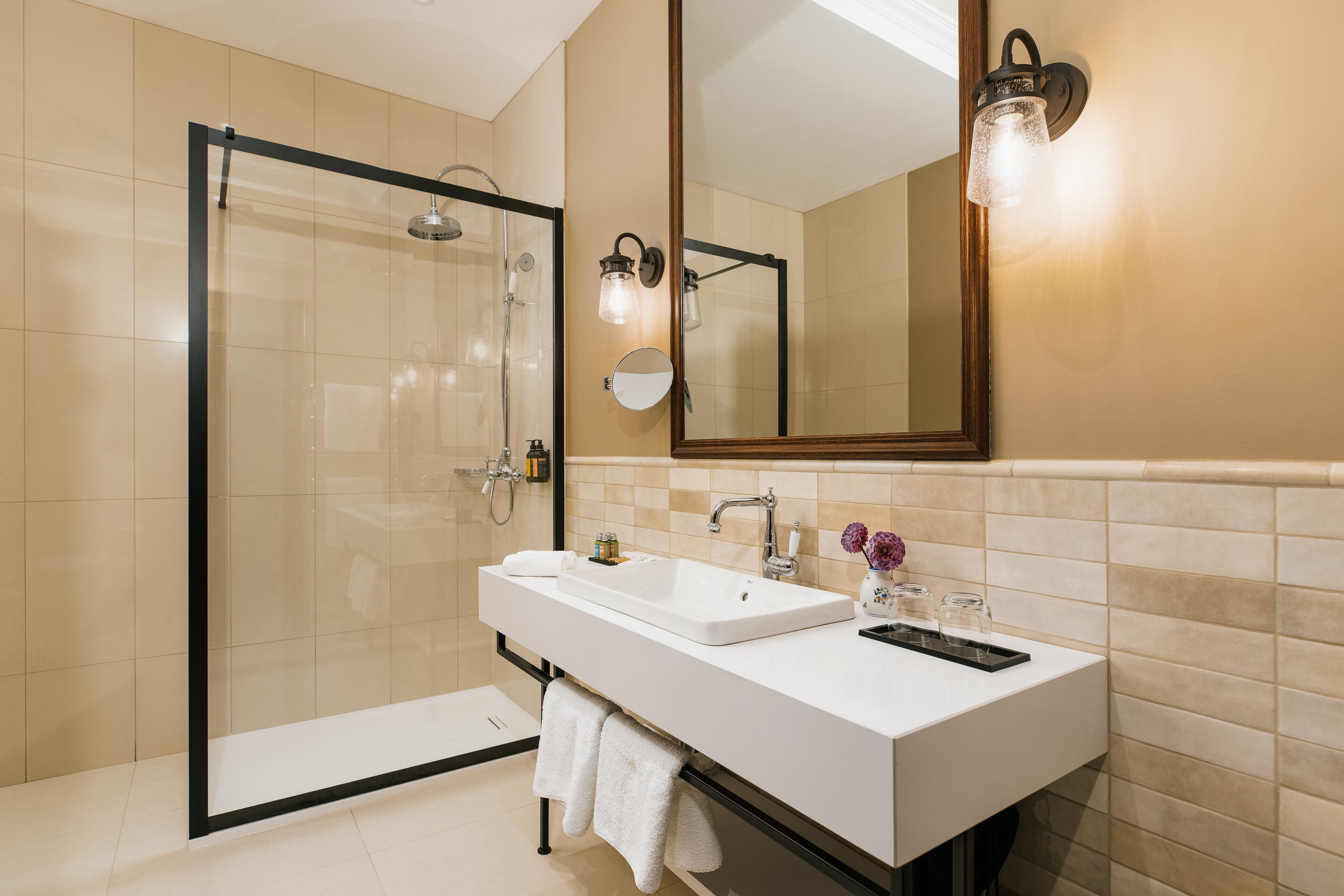 combined shower/bathtub, designer toiletries, hair dryer, dressing gowns