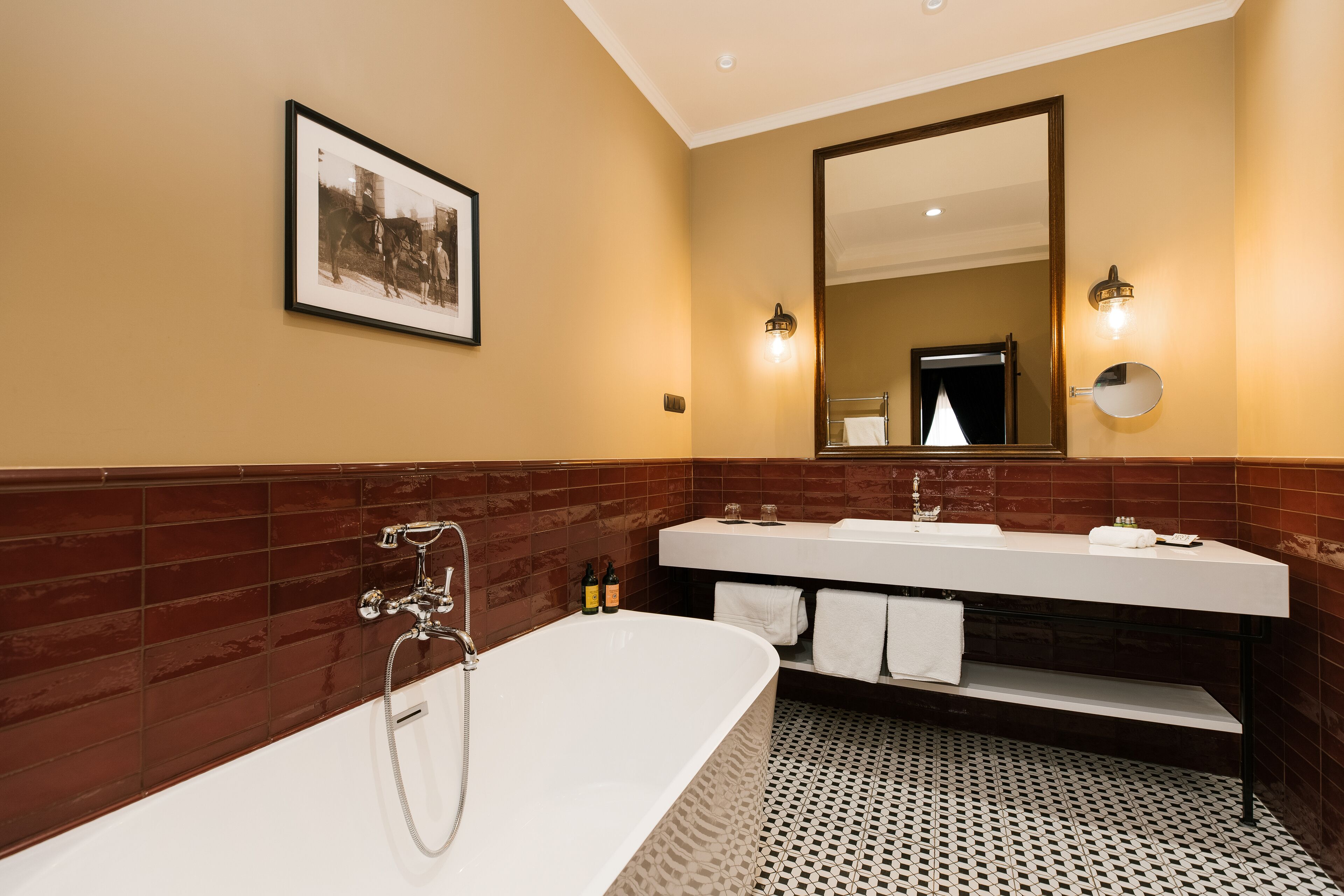 presidential suite | bathroom | combined shower/bathtub, designer toiletries, hair dryer, dressing gowns