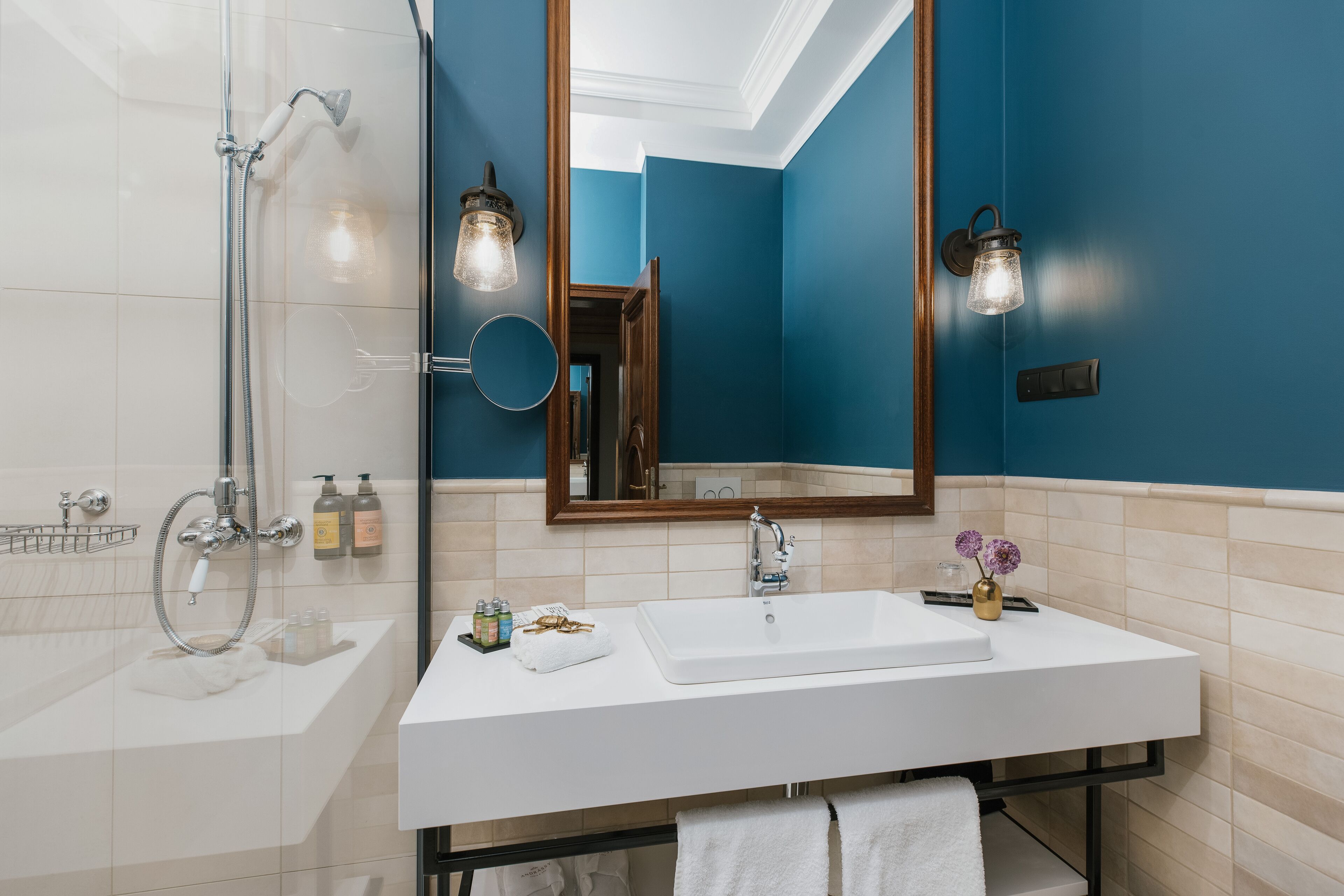 combined shower/bathtub, designer toiletries, hair dryer, dressing gowns