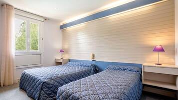 Twin Room | Premium bedding, desk, blackout curtains, soundproofing