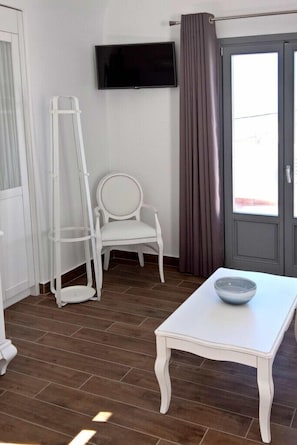 Quarto standard | Área de estar | TV de tela plana