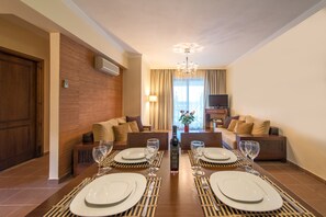 43-inch flat-screen TV with satellite channels, TV