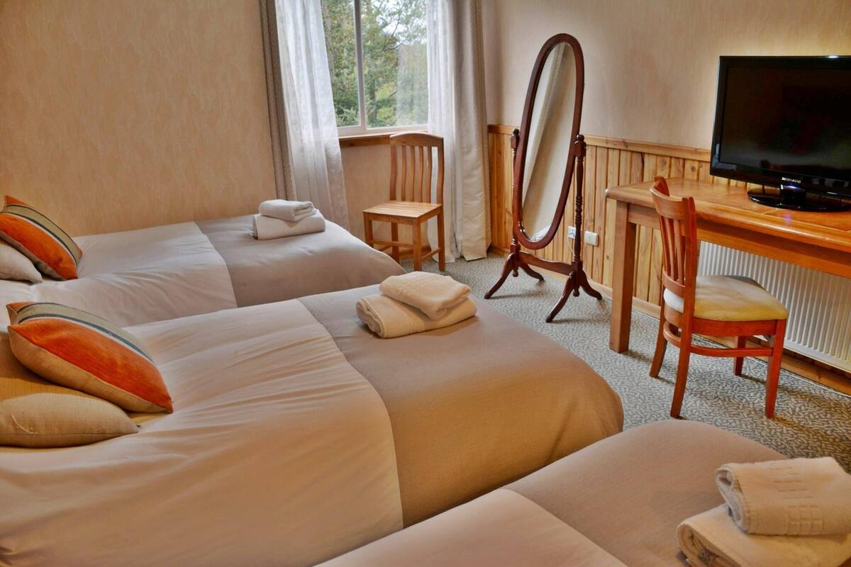 Premium bedding, down comforters, pillowtop beds, in-room safe