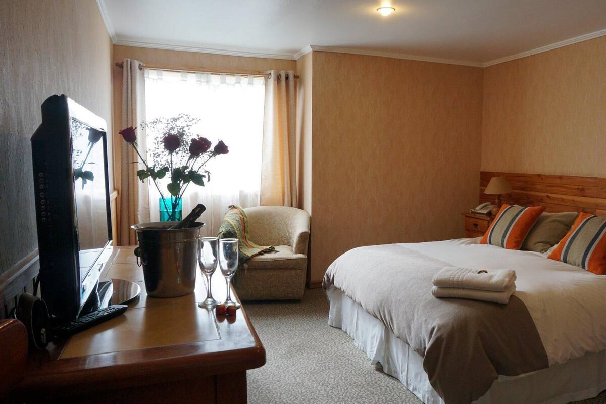 Premium bedding, down comforters, pillowtop beds, in-room safe
