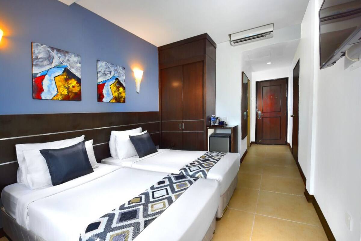 Memory-foam beds, minibar, in-room safe, laptop workspace
