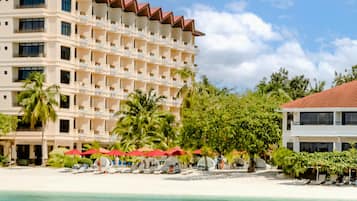 Private beach, white sand, sun loungers, beach towels