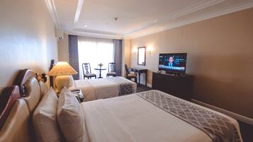 Quarto luxo | Frigobar, cortinas blackout, camas extras/dobráveis (sobretaxa)