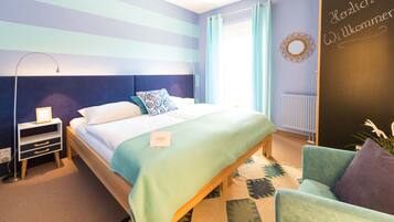 Zimmersafe, BĂŒgeleisen/BĂŒgelbrett, kostenloses WLAN, BettwĂ€sche