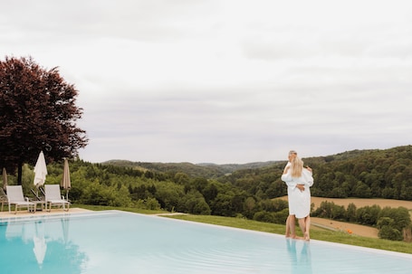 Seasonal outdoor pool, pool umbrellas, sun loungers