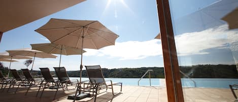 Seasonal outdoor pool, pool umbrellas, sun loungers