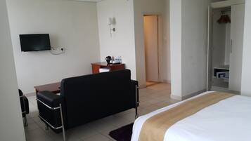 Habitación ejecutiva | Sala de estar | Televisión LCD