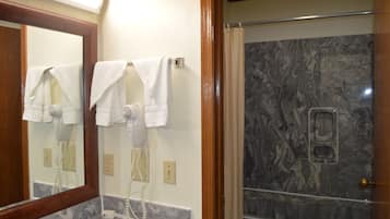 Standard Room, 1 King Bed | Bathroom | Combined shower/tub, hair dryer, towels