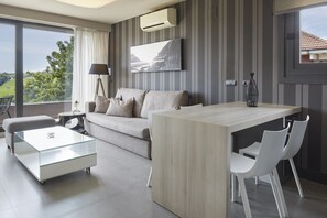 Apartment, 2 Bedrooms, Balcony | Living area | LCD TV