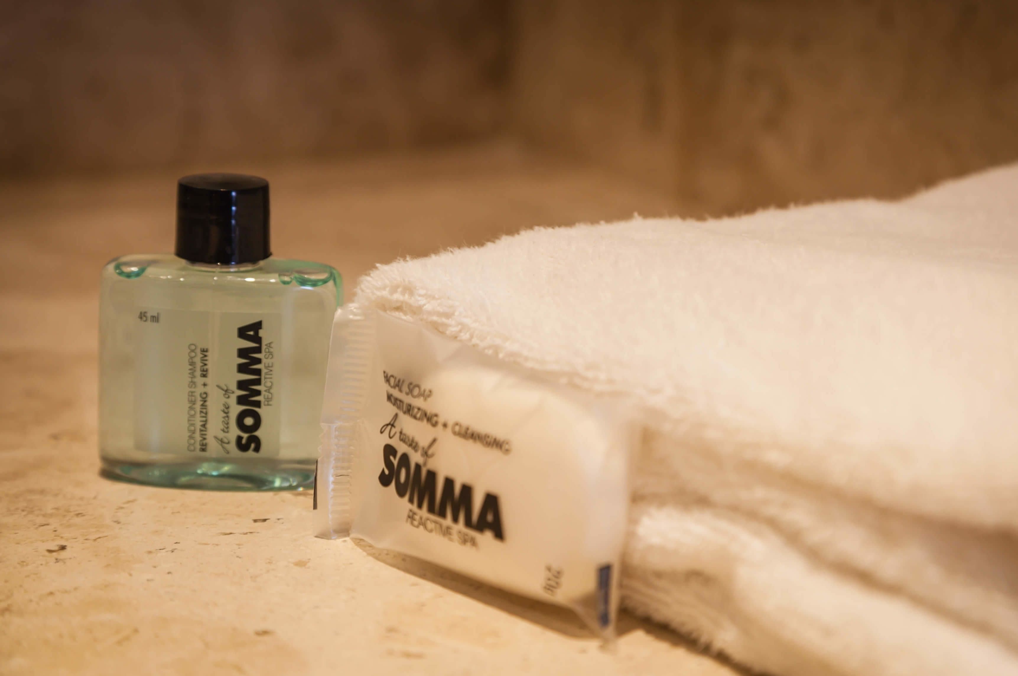 Shower, rainfall showerhead, hair dryer, towels