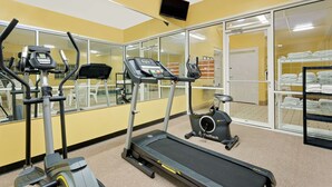 A gym with treadmills, elliptical machines, and an exercise bike. - Microtel Inn & Suites by Wyndham Princeton (Princeton)