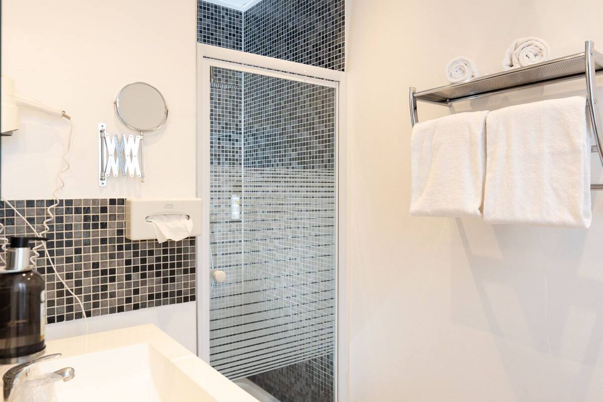 standard double room, 1 double bed, city view | bathroom | hair dryer, towels