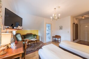 Twin Room | Individually furnished, desk, blackout curtains, free cots/infant beds