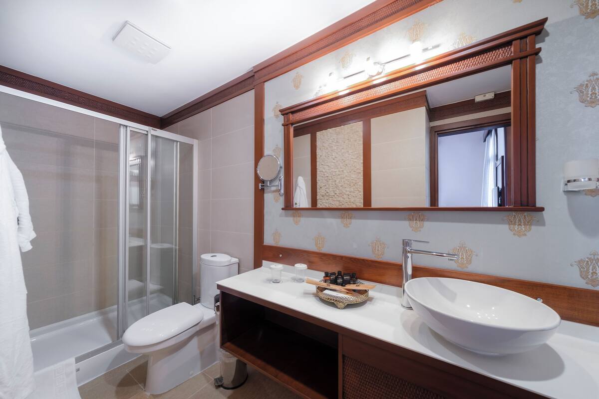 shower, rainfall showerhead, designer toiletries, hair dryer