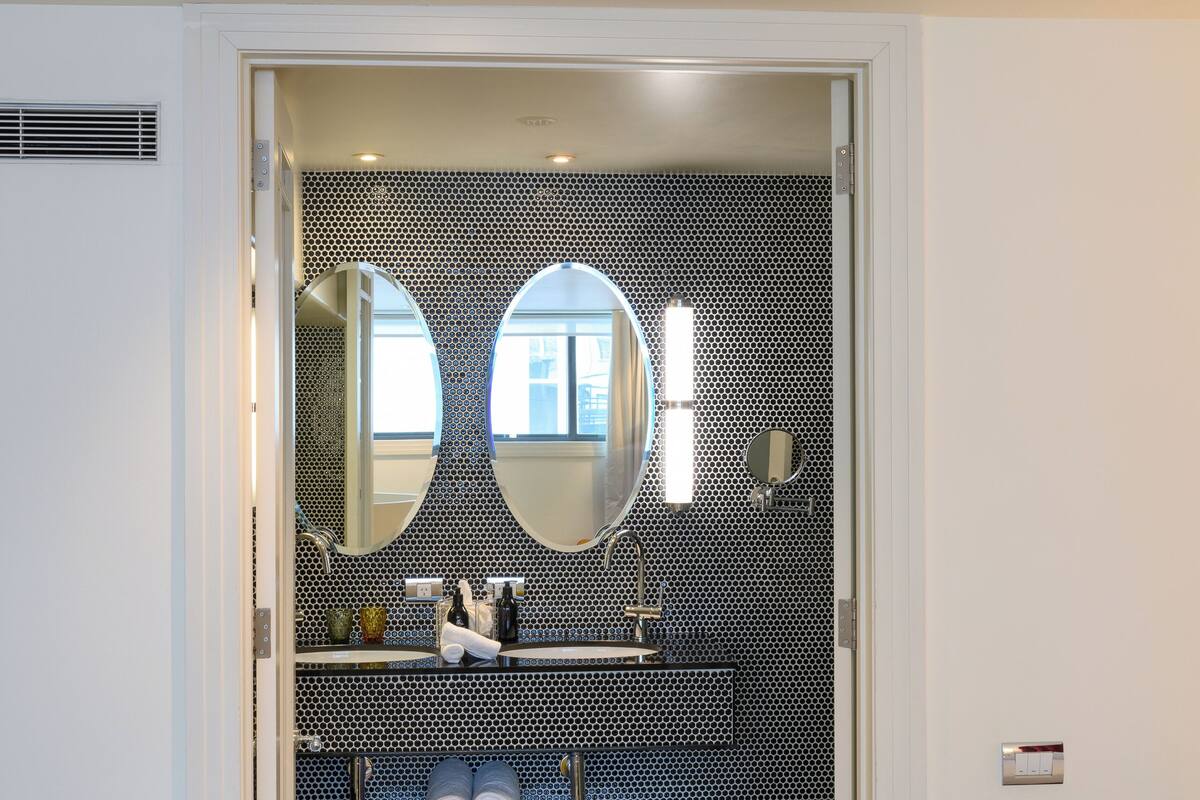 loft suite | bathroom | eco-friendly toiletries, hair dryer, bathrobes, slippers