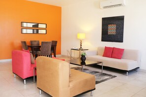 Apartment, 2 Bedrooms | Living room | TV - Midan Hotel Suites (Muscat)