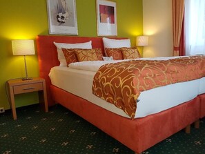 Pillow-top beds, desk, iron/ironing board, rollaway beds