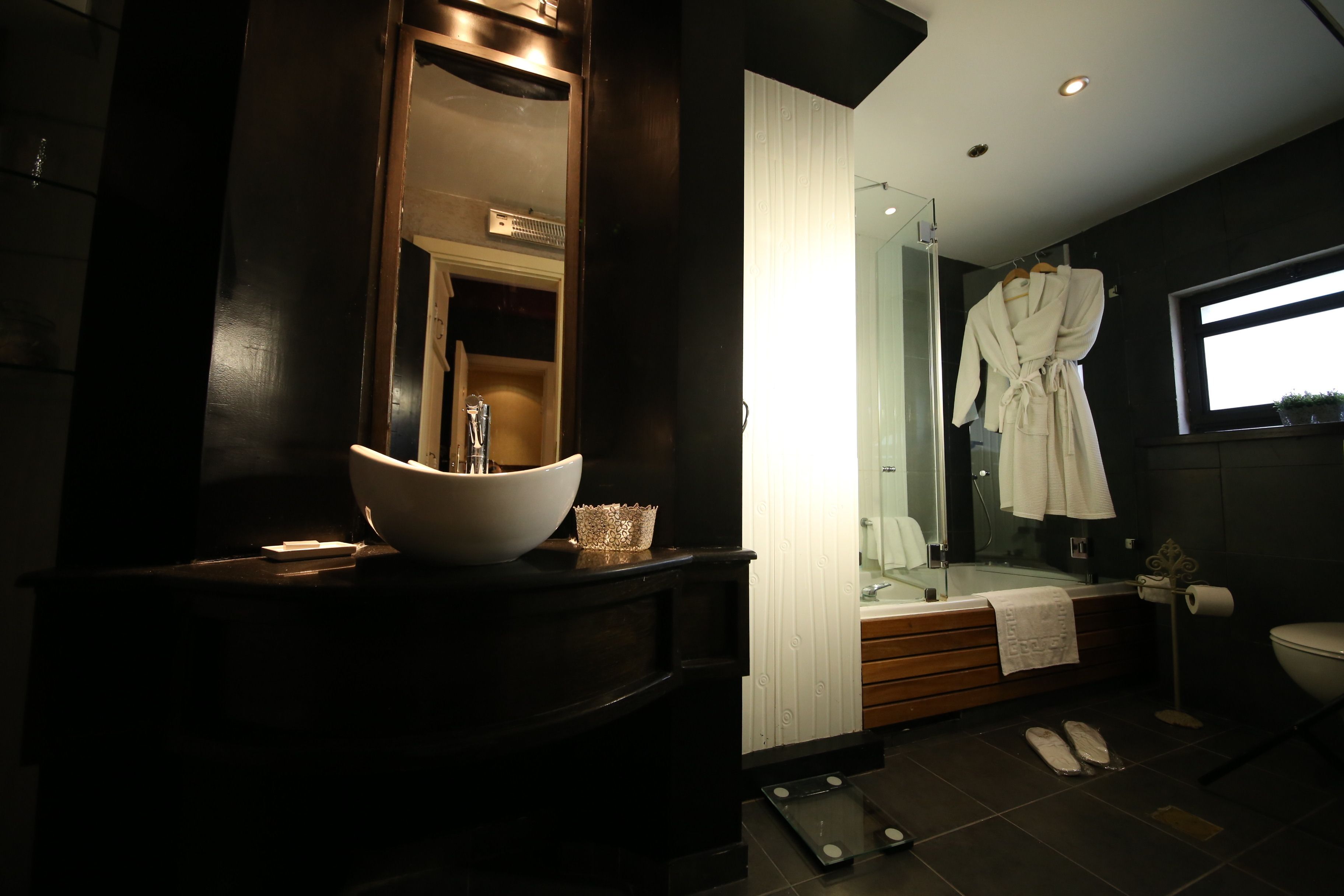 hair dryer, dressing gowns, slippers, towels