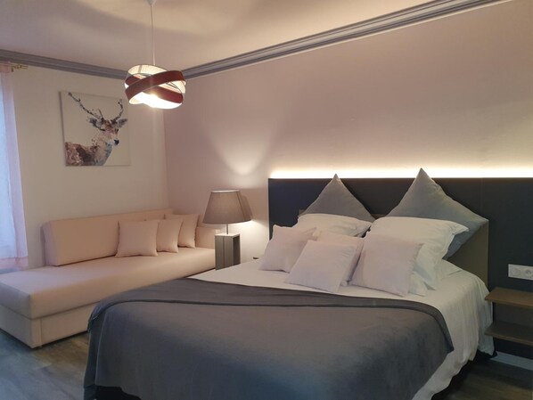 Premium bedding, individually decorated, desk, laptop workspace