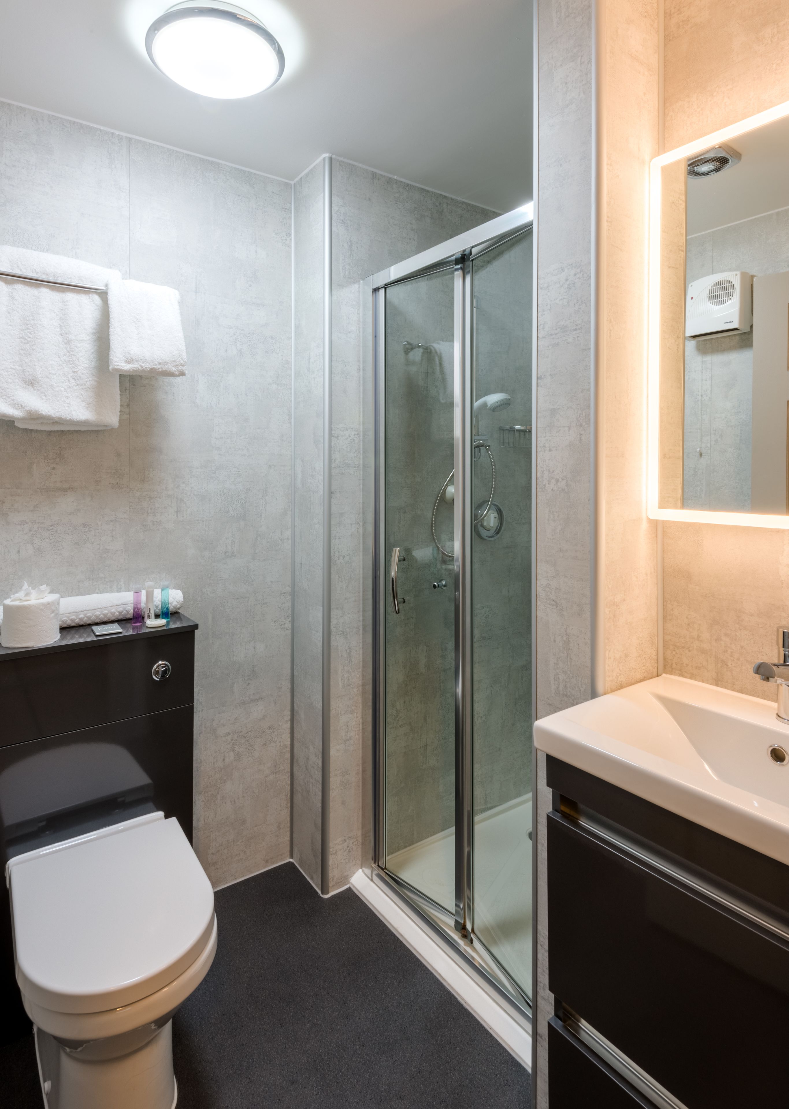 family room | bathroom | shower, hair dryer, towels