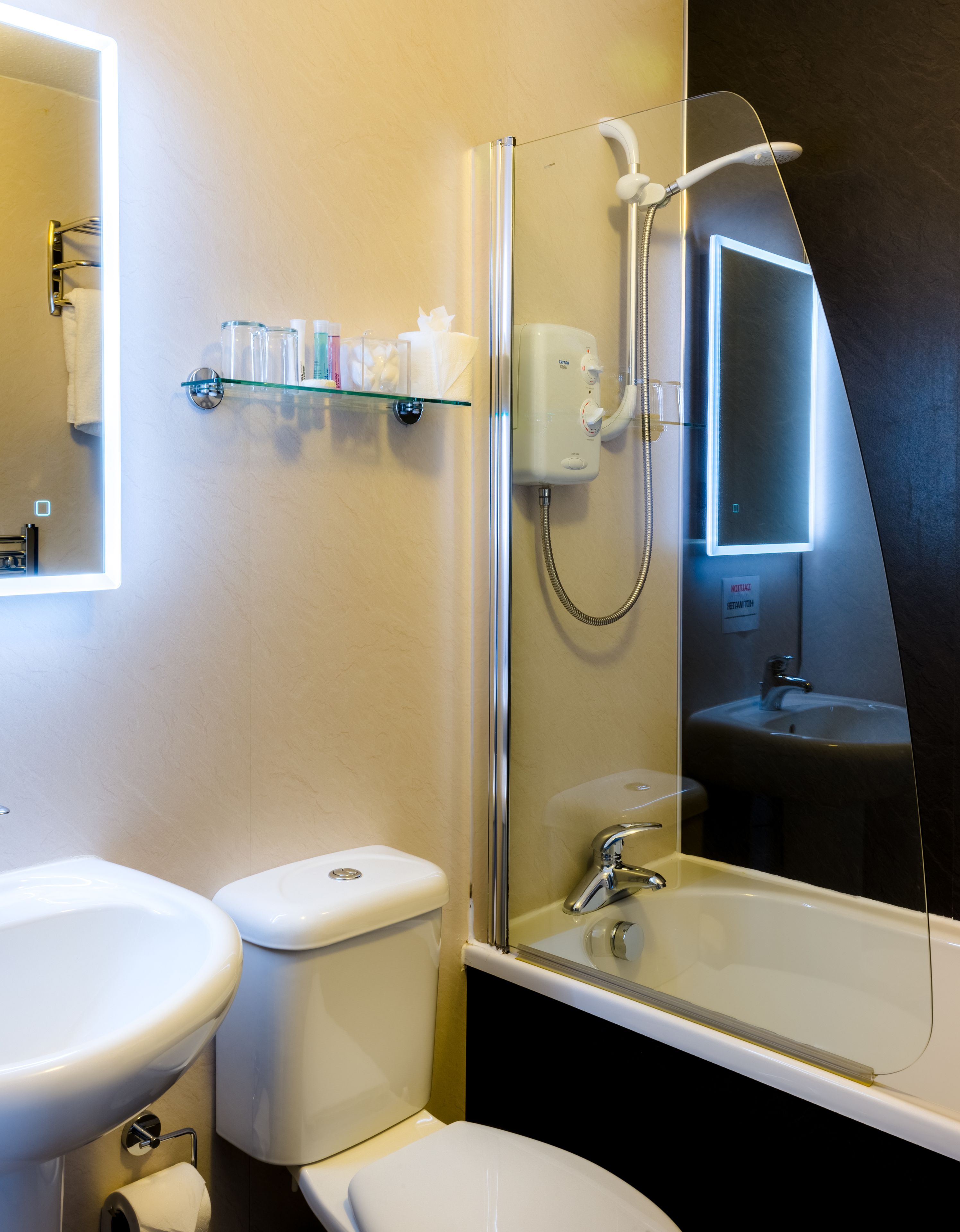 standard double room | bathroom | shower, hair dryer, towels