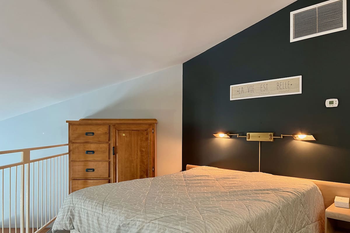 Condo Mezzanine, Kitchenette | Desk, iron/ironing board, free WiFi
