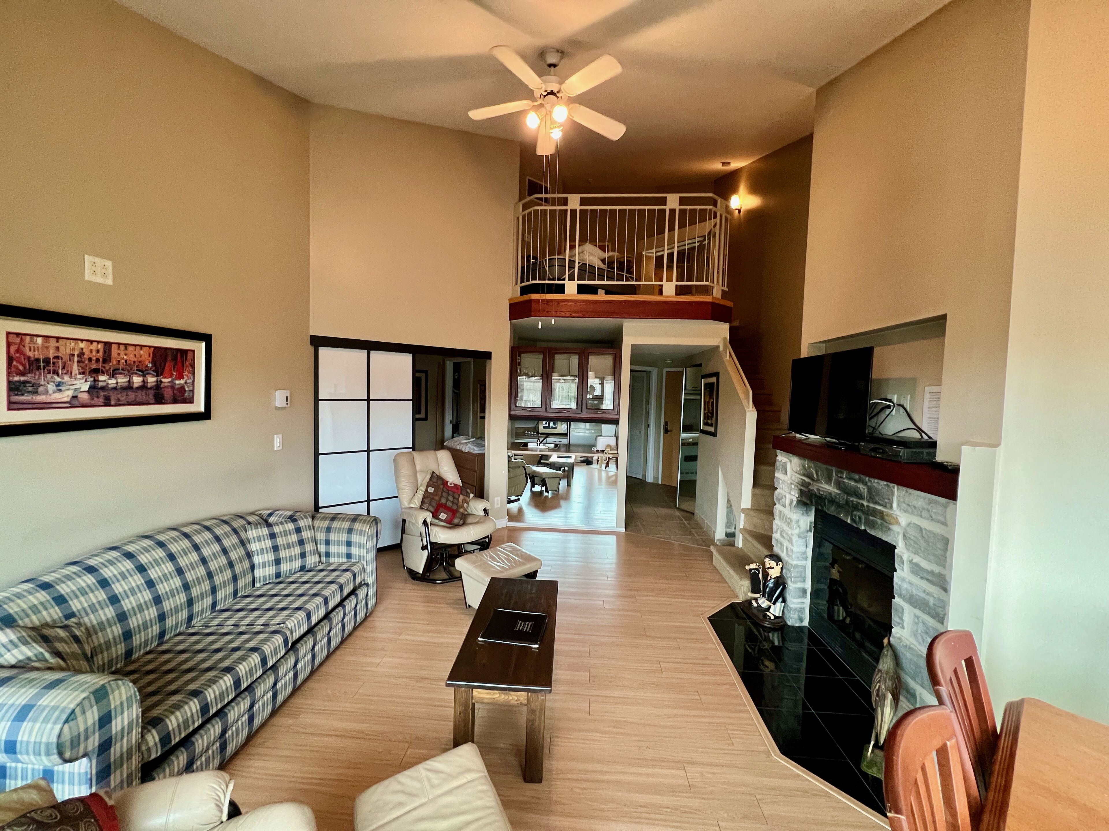 Deluxe Condo Mezzanine, Kitchen | Living area | Fireplace, DVD player