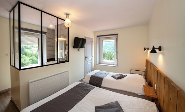 Triple Room | Individually decorated, desk, laptop workspace, blackout curtains - Hotel De la Grande Cascade (Le Tholy)