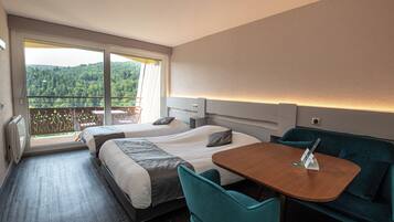 Panoramic Triple Room, Balcony | Individually decorated, desk, blackout drapes, free WiFi