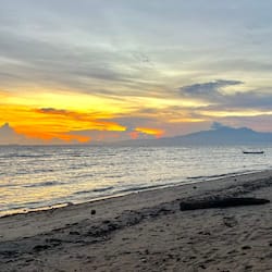 On the beach, sun-loungers, beach umbrellas, scuba diving