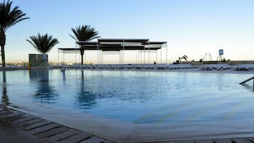 Outdoor pool, pool umbrellas, pool loungers